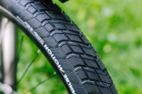 Schwalbe Pneu Motion Big Apple 27.5x2.15 Addix Green starr mit Reflexstreifen black